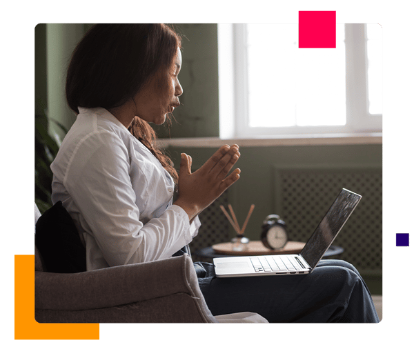 Female behavioral health practitioner using laptop